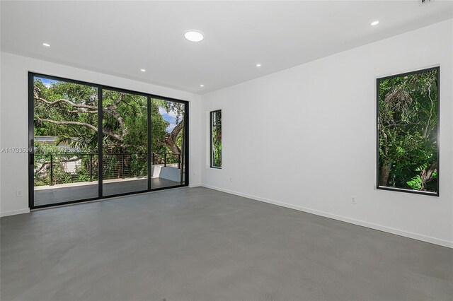 2730 SW 17th Ave, Miami, FL 33133 - unfurnished room featuring recessed lighting, baseboards, and concrete floors