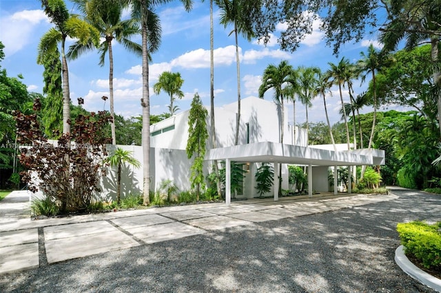 view of property's community featuring fence