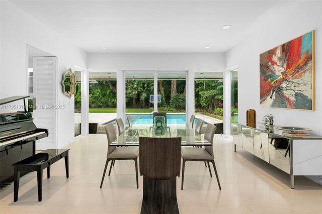 dining room featuring recessed lighting