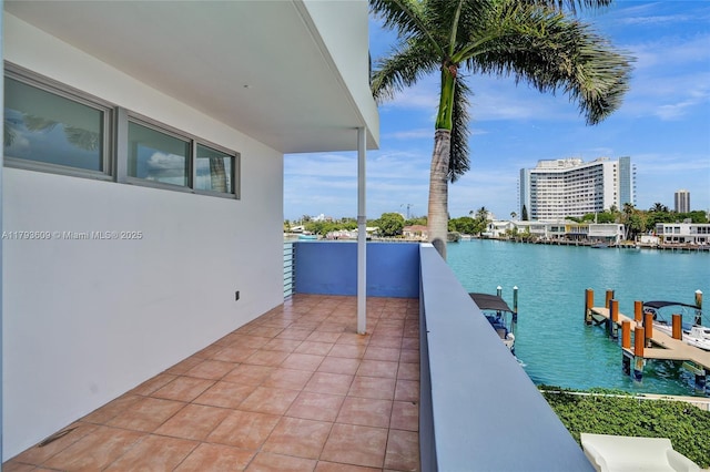 171 N Shore Dr Unit 171-1, Miami Beach, FL 33141 - dock area with a water view and a balcony