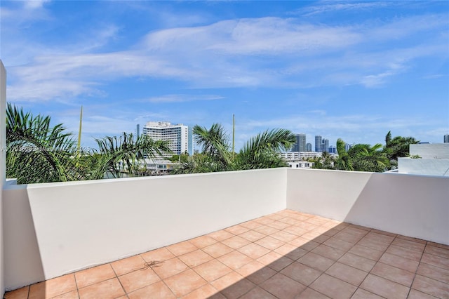 171 N Shore Dr Unit 171-1, Miami Beach, FL 33141 - view of patio featuring a city view and a balcony