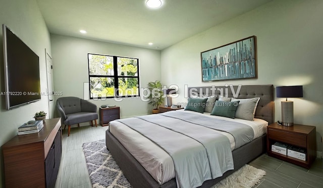 bedroom featuring recessed lighting