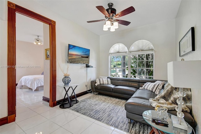 12360 SW 1st St, Plantation, FL 33325 - living area featuring light tile patterned floors and a ceiling fan