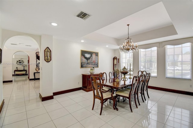 12360 SW 1st St, Plantation, FL 33325 - dining space with light tile patterned floors, recessed lighting, baseboards, arched walkways, and a chandelier