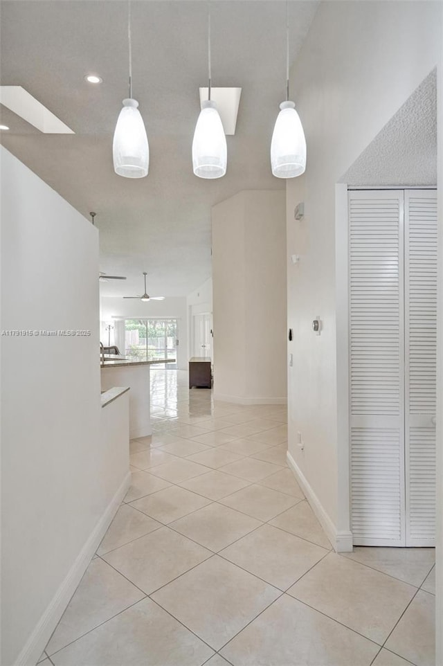 9751 Malvern Dr, Tamarac, FL 33321 - hall with recessed lighting, baseboards, and light tile patterned floors