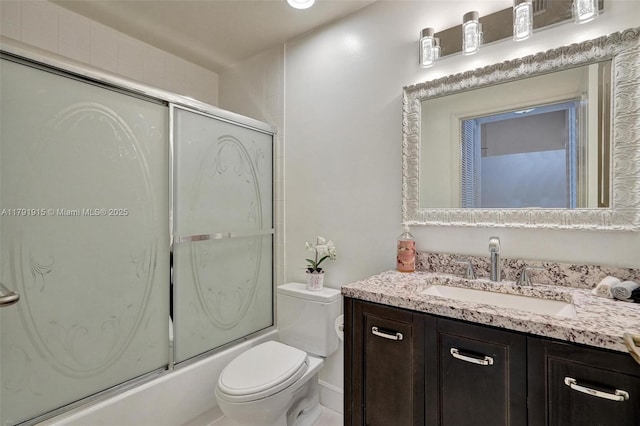 9751 Malvern Dr, Tamarac, FL 33321 - full bathroom with vanity, enclosed tub / shower combo, and toilet