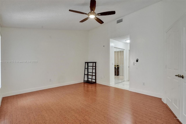 9751 Malvern Dr, Tamarac, FL 33321 - spare room featuring baseboards, a ceiling fan, wood finished floors, and visible vents