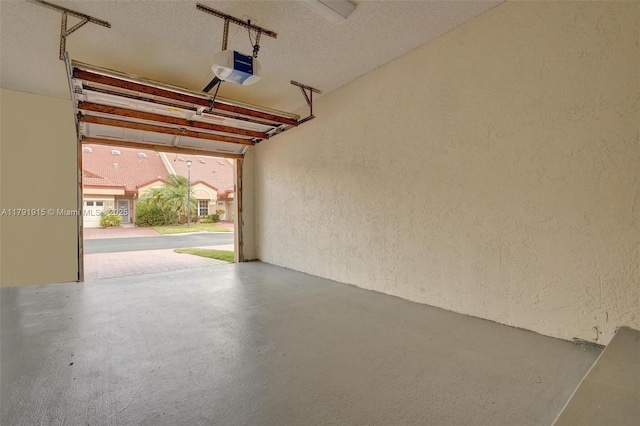 9751 Malvern Dr, Tamarac, FL 33321 - garage with a textured wall and a garage door opener