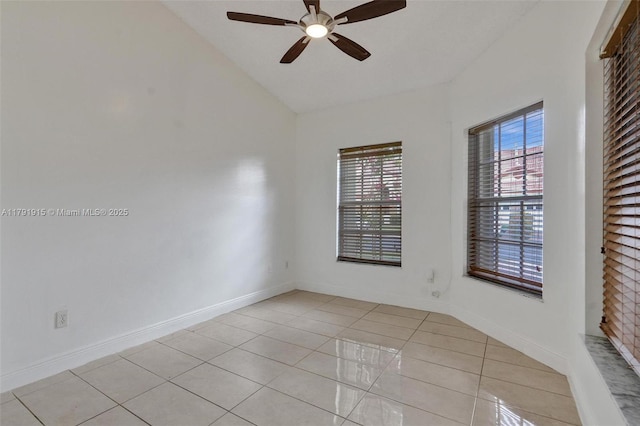 9751 Malvern Dr, Tamarac, FL 33321 - spare room featuring a ceiling fan, baseboards, light tile patterned flooring, and vaulted ceiling