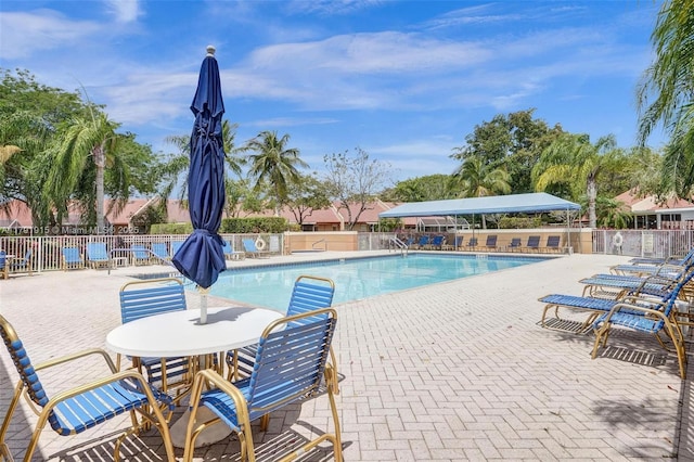 9751 Malvern Dr, Tamarac, FL 33321 - pool featuring a patio area and fence
