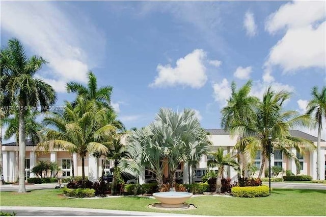 9751 Malvern Dr, Tamarac, FL 33321 - view of front facade featuring a front yard