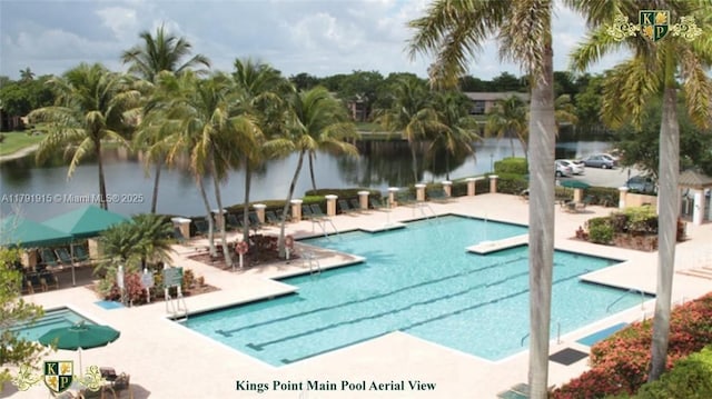 9751 Malvern Dr, Tamarac, FL 33321 - community pool featuring a patio area and a water view