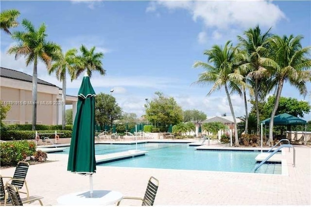 9751 Malvern Dr, Tamarac, FL 33321 - pool with a patio