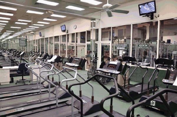 9751 Malvern Dr, Tamarac, FL 33321 - exercise room with a ceiling fan