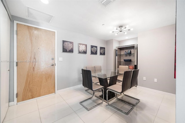 tiled dining room featuring visible vents, attic access, baseboards, and recessed lighting