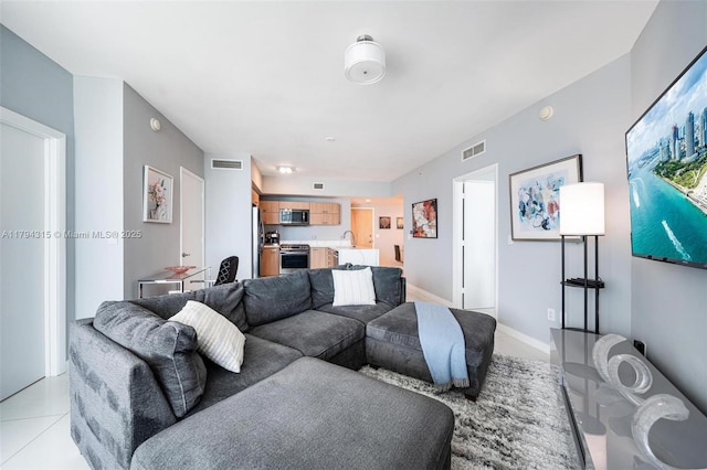 living area featuring visible vents