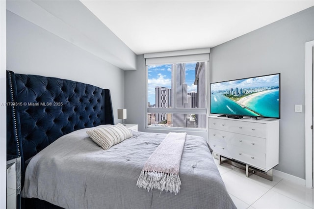 tiled bedroom with baseboards