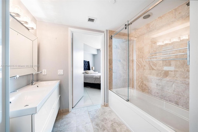 full bath with visible vents, double vanity, baseboards, connected bathroom, and combined bath / shower with glass door