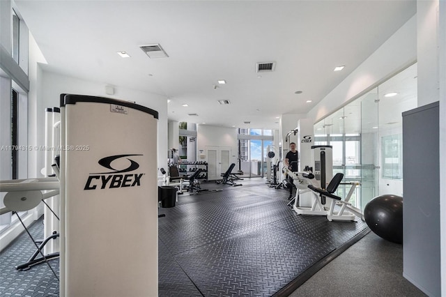gym with recessed lighting and visible vents
