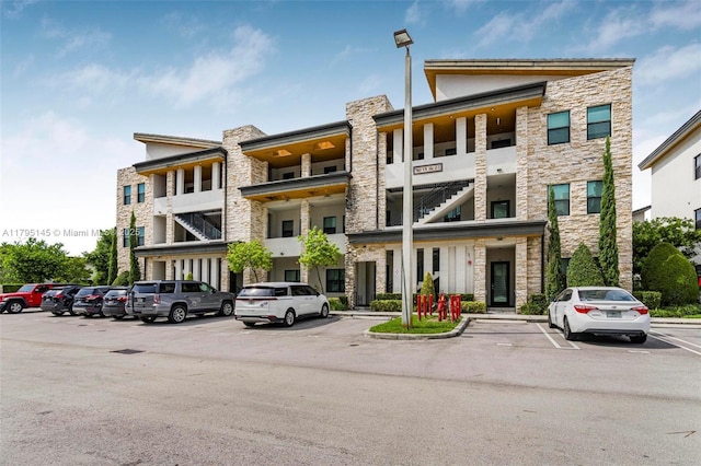 7865 NW 104th Ave Unit 33, Doral, FL 33178 - view of building exterior with uncovered parking