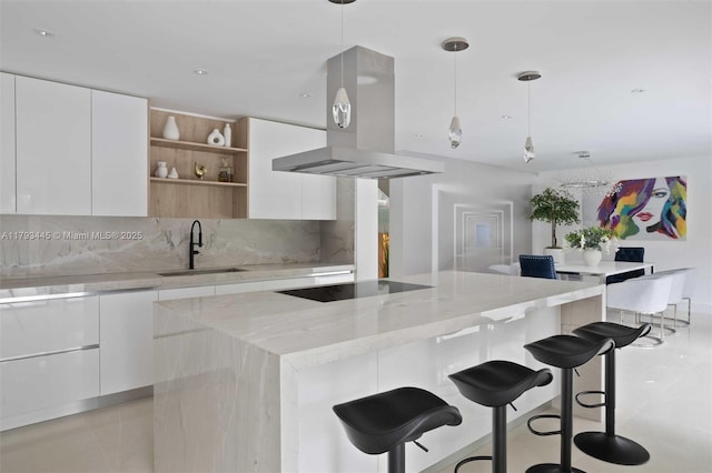 kitchen featuring a sink, modern cabinets, black electric stovetop, and extractor fan