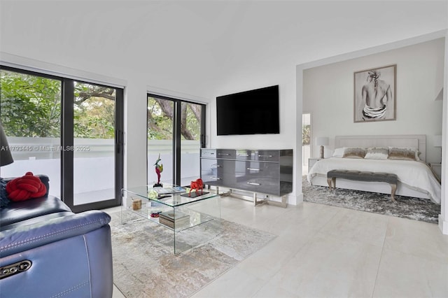 living room featuring lofted ceiling