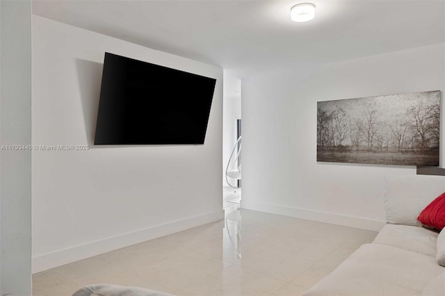 tiled living room with baseboards