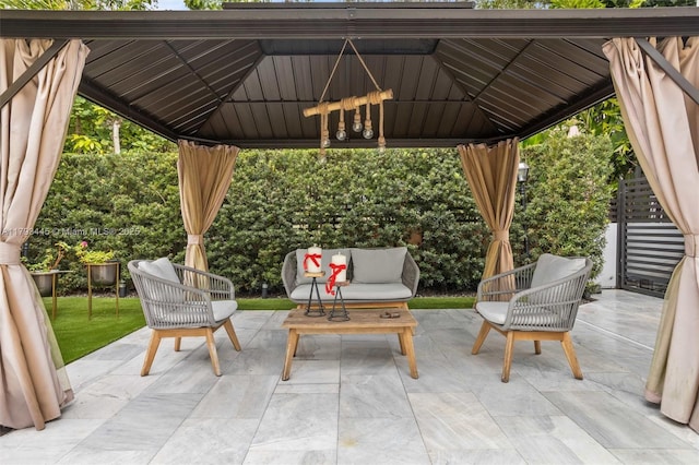 view of patio featuring a gazebo