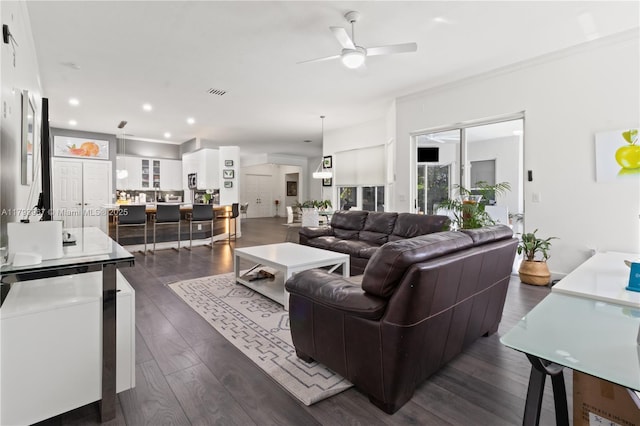 living room with recessed lighting, ceiling fan, dark wood-style floors, and visible vents