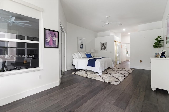 bedroom with ceiling fan, baseboards, dark wood-style floors, ensuite bathroom, and recessed lighting