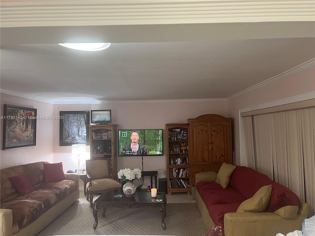living room featuring ornamental molding and carpet flooring