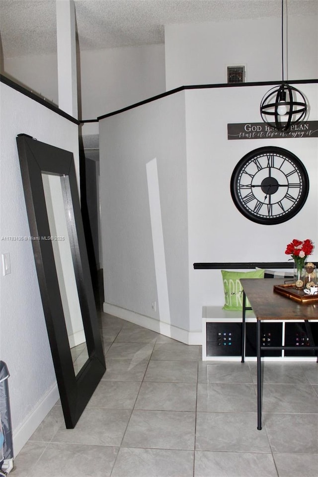 3638 NW 83rd Ln, Sunrise, FL 33351 - interior space with a textured ceiling, visible vents, baseboards, and tile patterned floors