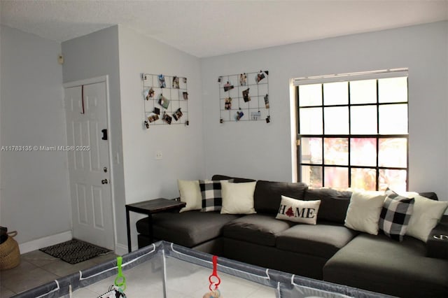 3638 NW 83rd Ln, Sunrise, FL 33351 - living area featuring baseboards and tile patterned flooring
