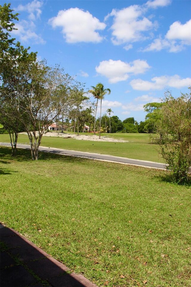 3638 NW 83rd Ln, Sunrise, FL 33351 - surrounding community with a yard
