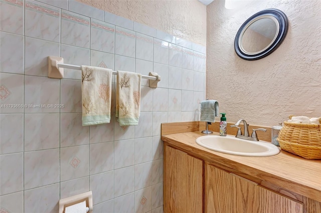 9829 Riverside Dr Unit 42-6, Coral Springs, FL 33071 - bathroom with a textured wall and vanity
