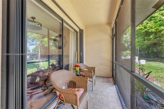 sunroom featuring a healthy amount of sunlight