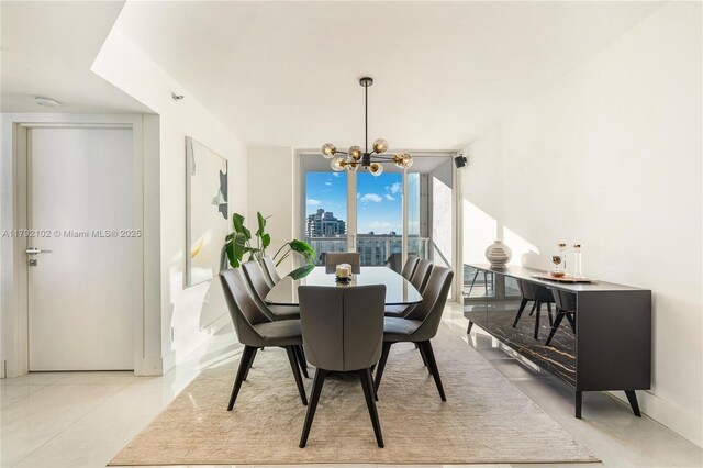 16485 Collins Ave Unit 2438, Sunny Isles Beach, FL 33160 - dining area featuring an inviting chandelier and expansive windows
