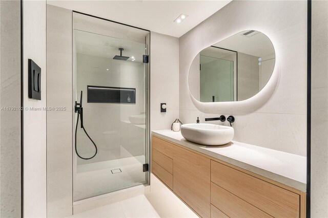 16485 Collins Ave Unit 2438, Sunny Isles Beach, FL 33160 - bathroom with vanity and a stall shower