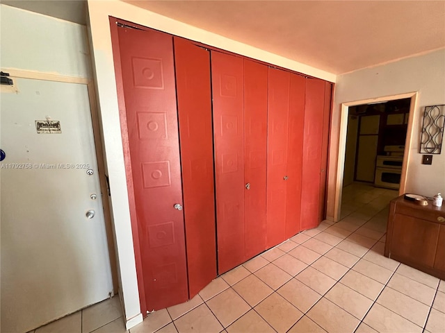 5005 Collins Ave Unit 214, Miami Beach, FL 33140 - hall featuring light tile patterned flooring