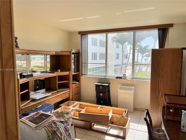 5005 Collins Ave Unit 214, Miami Beach, FL 33140 - living area with tile patterned floors