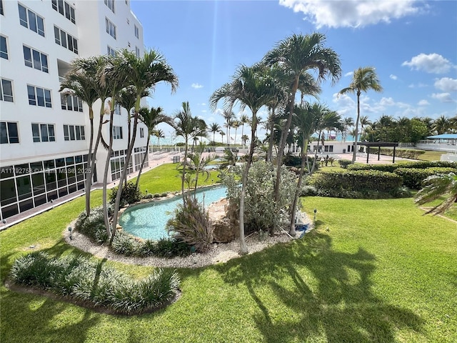 5005 Collins Ave Unit 214, Miami Beach, FL 33140 - view of property's community with a lawn