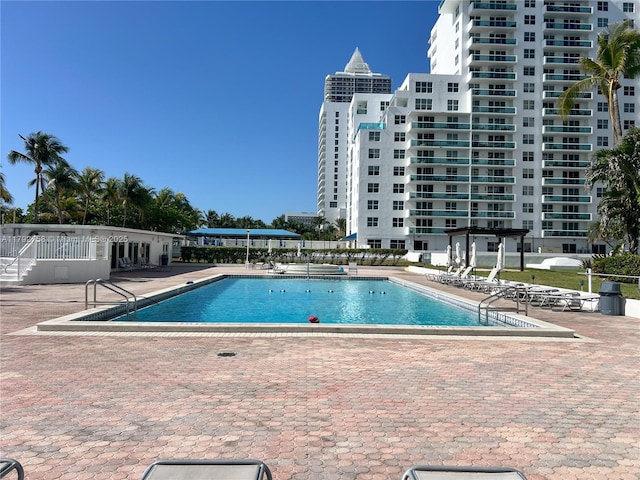 5005 Collins Ave Unit 214, Miami Beach, FL 33140 - pool featuring a patio