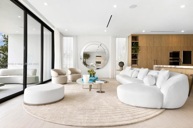310 W Dilido Dr, Miami Beach, FL 33139 - living room with recessed lighting and expansive windows