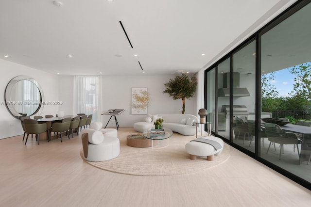 310 W Dilido Dr, Miami Beach, FL 33139 - living room featuring plenty of natural light, floor to ceiling windows, and recessed lighting
