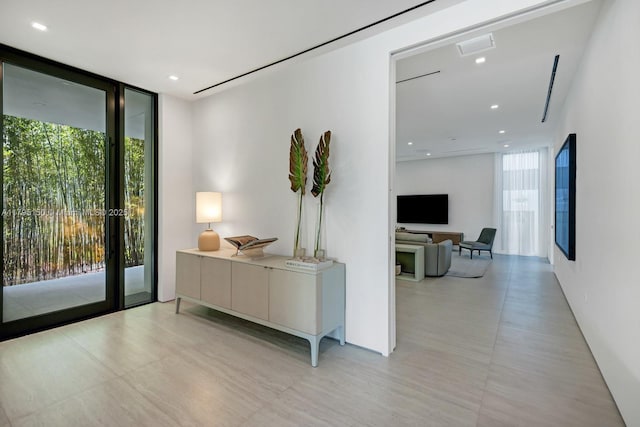 310 W Dilido Dr, Miami Beach, FL 33139 - hallway featuring floor to ceiling windows