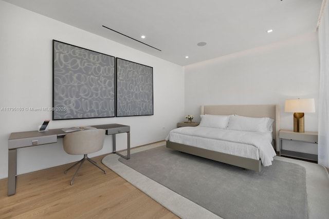 310 W Dilido Dr, Miami Beach, FL 33139 - bedroom featuring wood finished floors, recessed lighting, and a desk