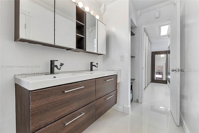 517 NE 38th St Unit 9, Miami, FL 33137 - kitchen featuring appliances with stainless steel finishes, butcher block counters, a sink, light wood-style floors, and recessed lighting