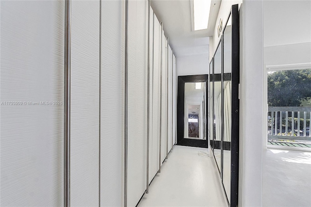 517 NE 38th St Unit 9, Miami, FL 33137 - hallway featuring concrete floors