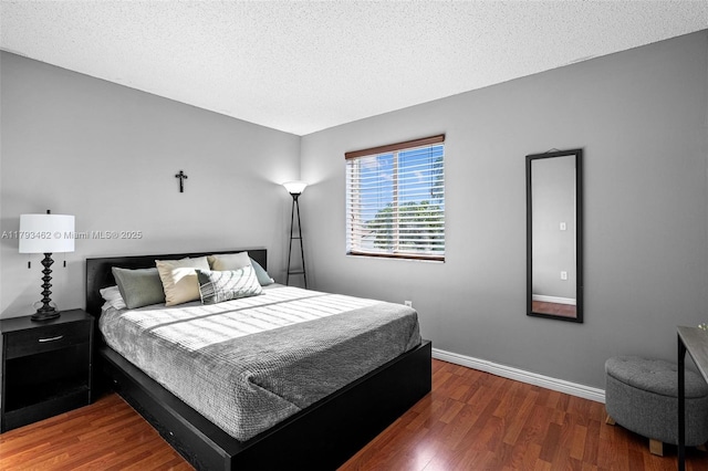 16080 SW 138th Pl, Miami, FL 33177 - bedroom featuring wood finished floors and a textured ceiling
