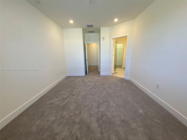 10250 NW 66th St Unit 103, Doral, FL 33178 - unfurnished bedroom featuring baseboards, carpet flooring, and recessed lighting